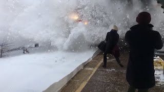 Watch Amtrak Train Create Crazy Wave of Snow While Pulling Into Station [upl. by Leuname]