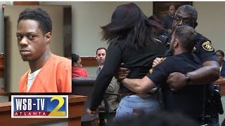 WATCH Murder victims teen daughter lunges at accused killer removed from courtroom  WSBTV [upl. by Lairbag]